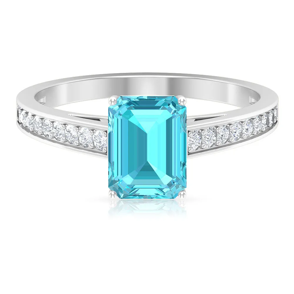 6X8 MM Emerald Cut Shaped Swiss Blue Topaz Solitaire with Diamond Side Stone Ring