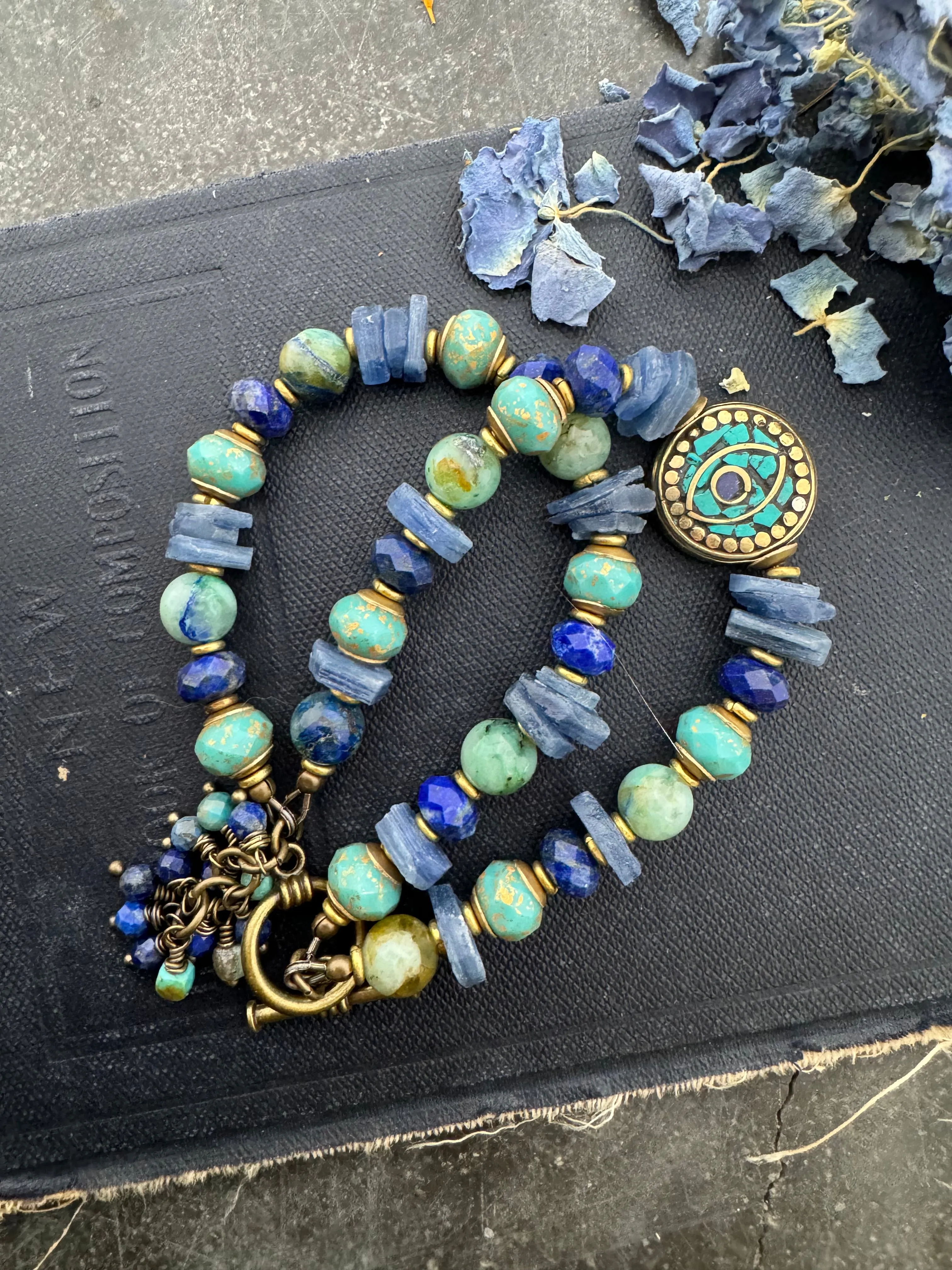 Azurite, kyanite, Turquoise stone, lapis lazuli stone, nepal beads, Czech glass, brass metal bracelet.