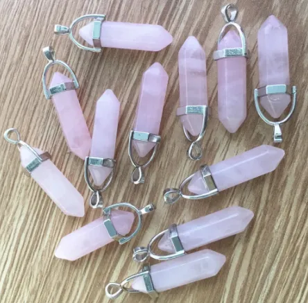 BULLET SHAPED ROSE QUARTZ CUT STONE PENDANTS ( sold by the piece or dozen )