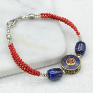 Coral with Round Flat Bead Tibetan Bracelet