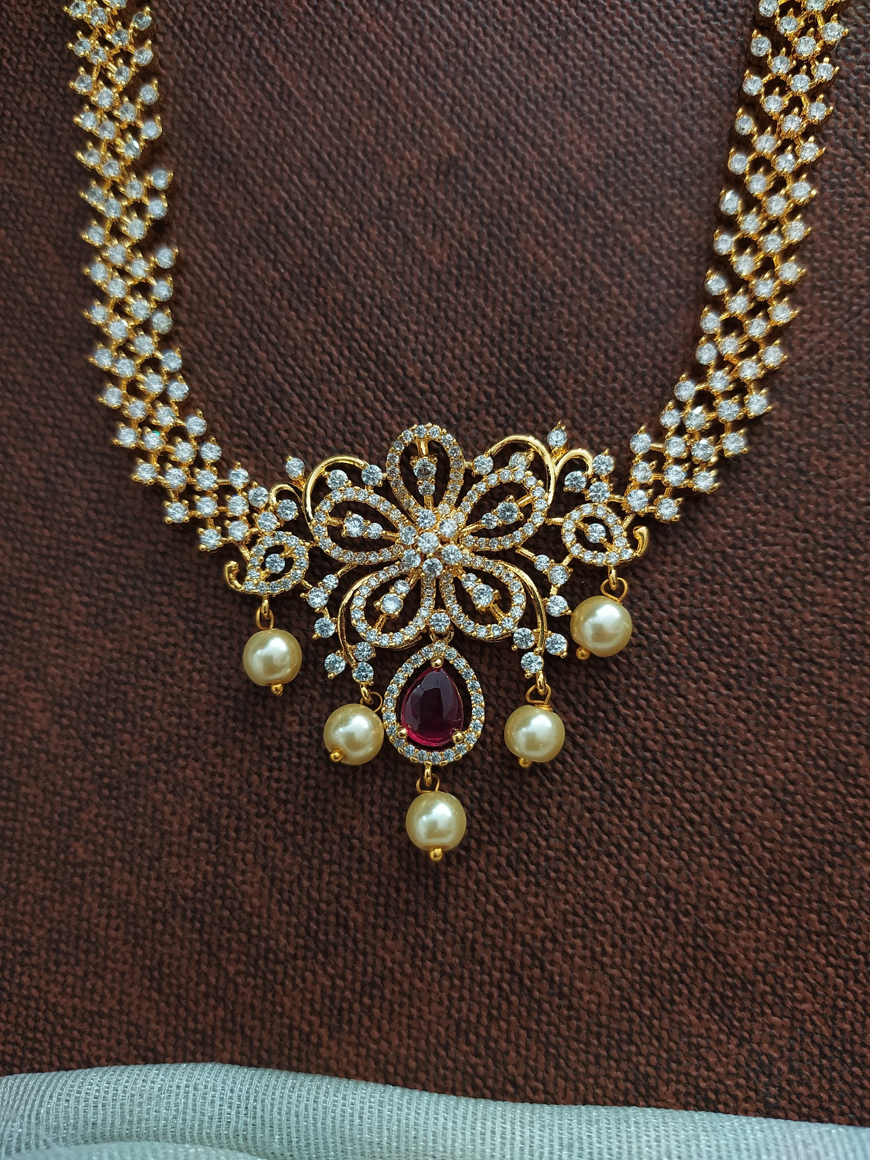 Embrace Timeless Elegance Of Gold-Plated Floral Pendant Zircon Long Haram Set